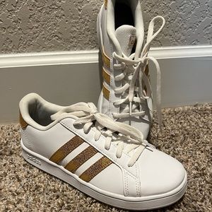 Gold and white adidas!